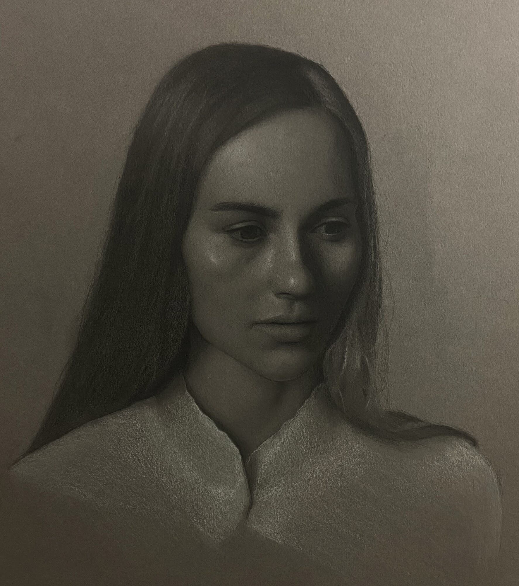 Graphite and white chalk on toned paper drawing titled Portrait of Alyssa by Omar Radwan